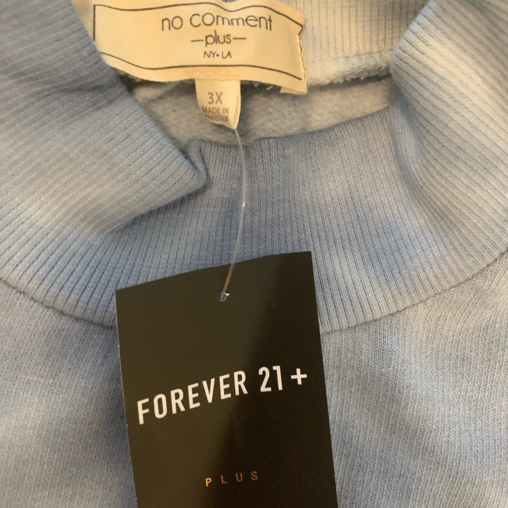 Brand new with tags, material is flannel on the inside, slight turtle neck.